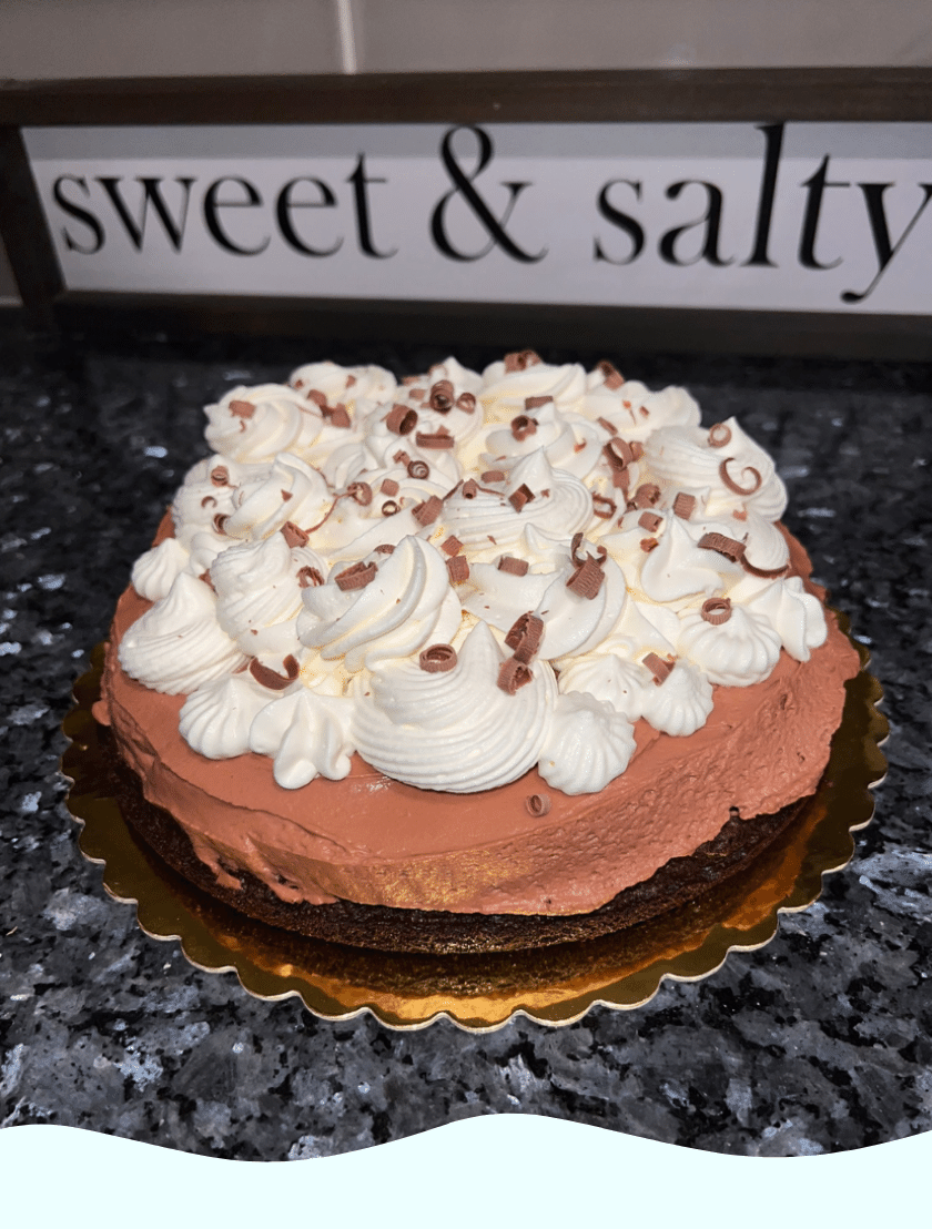 Gluten Free chocolate cream pie topped with whipped cream